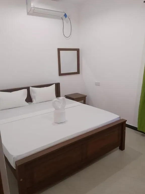 Bed and air conditioner inside the room