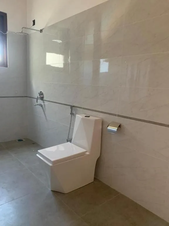 Attached bathroom of the Deluxe Double Room