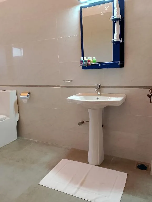 Bathroom sink and mirror area