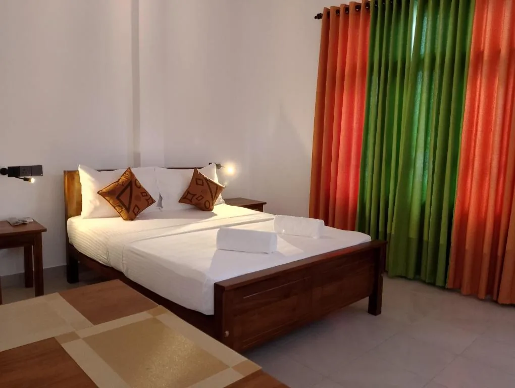 Closer room view with one of the beds