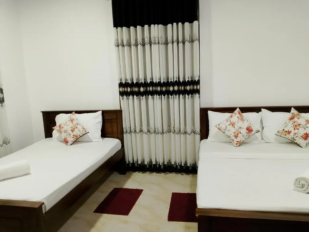Another room view inside the Deluxe Triple Room